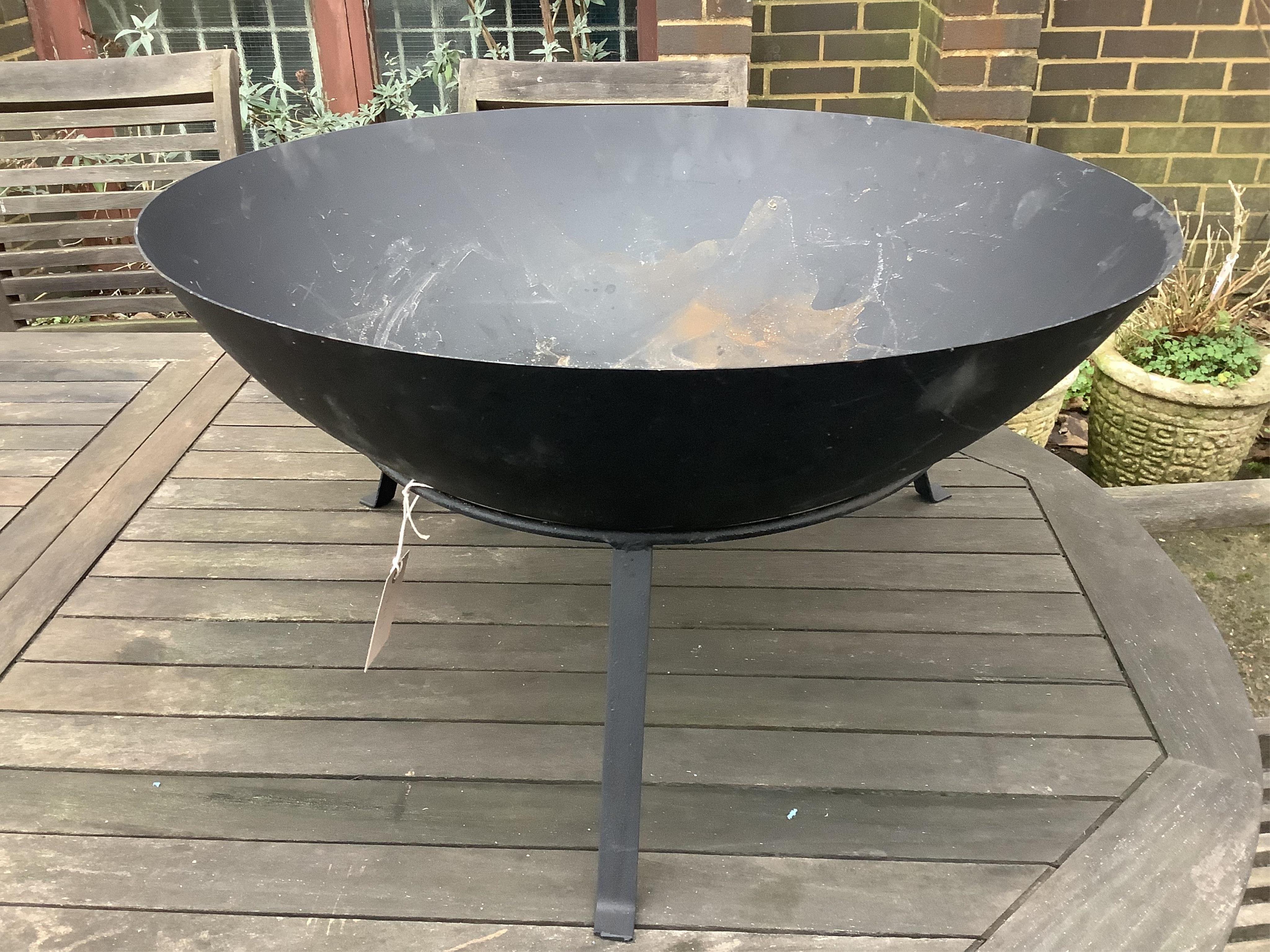 A garden brazier, diameter 59cm, height 32cm. Condition - fair